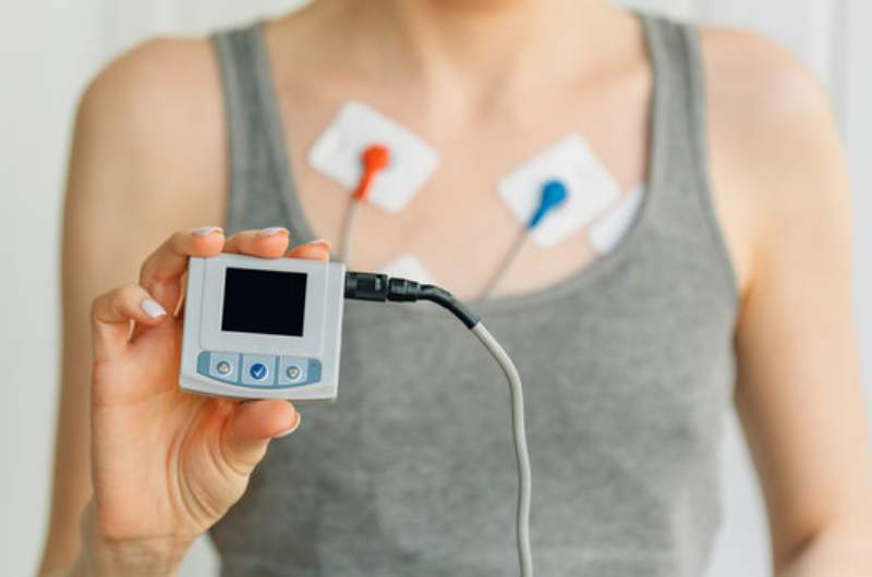 Individual wearing 24 hour holter monitoring system - available at Narangba Station Medical Centre.