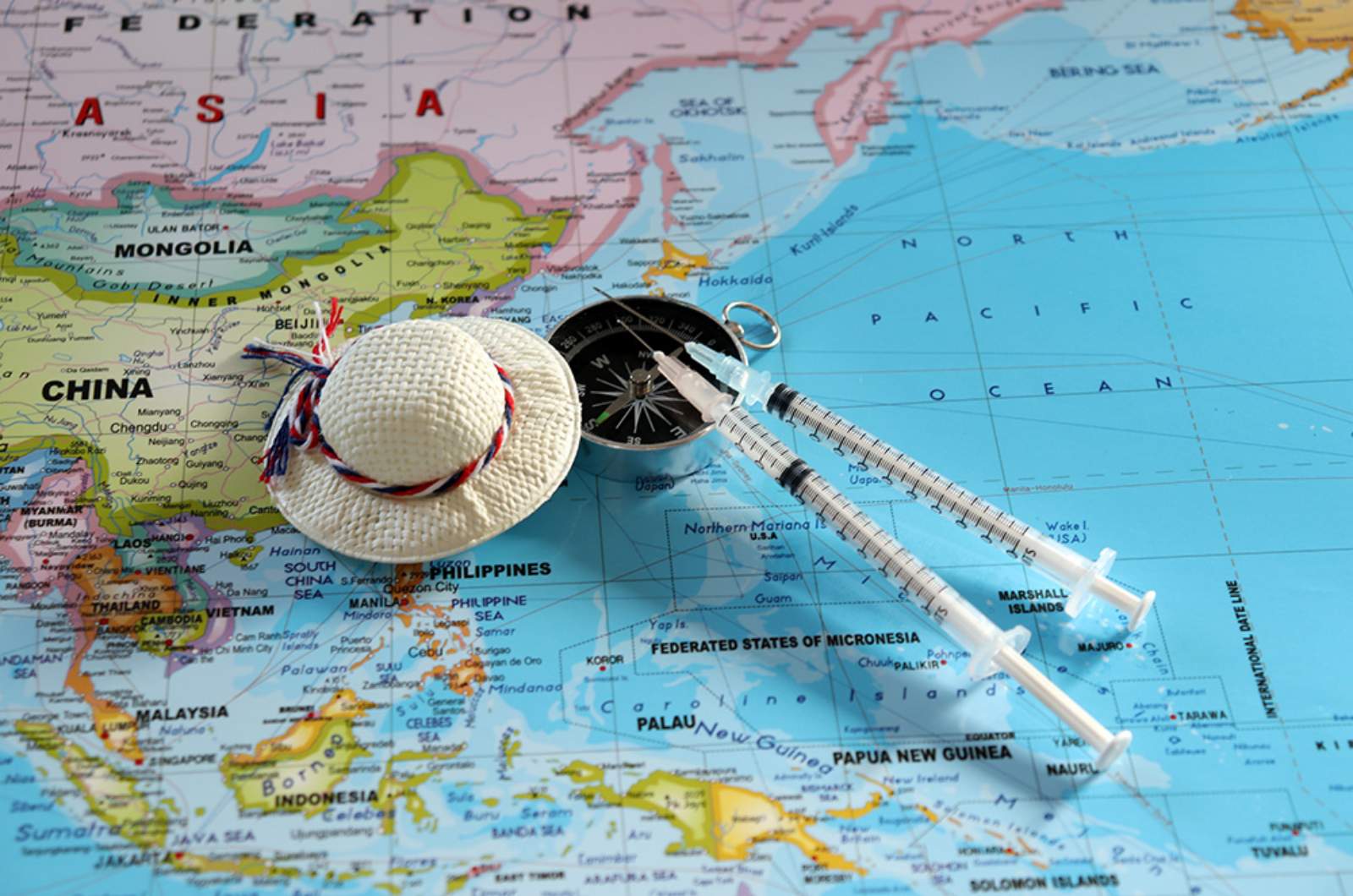 Travel items and travel vaccinations displayed on a world map.