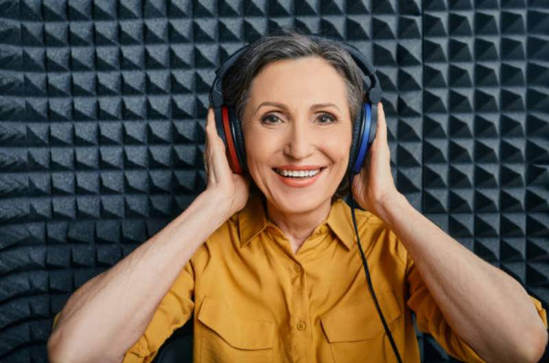 Woman with headphones on completing hearing test