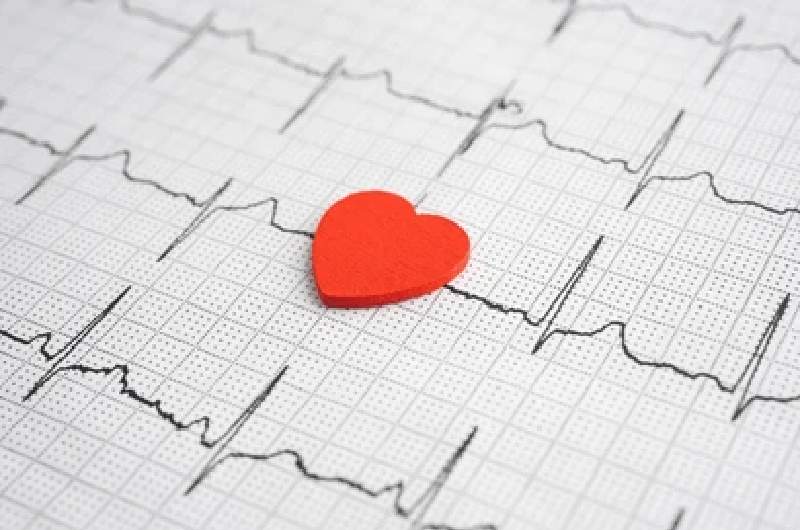 Electrocardiogram-ecg-results-graph-with-heart-in-centre Electrocardiogram ecg results graph with heart in centre.
